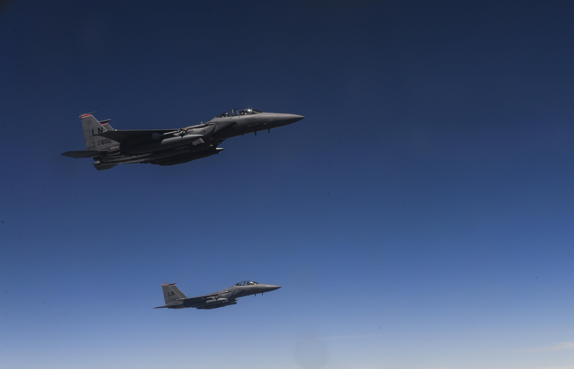 U.S. Air Force F-15E Strike Eagles fly after receiving fuel from a KC-135 Stratotanker May 3, 2017. The KC-135 is capable of transferring up to 200,000 pounds of fuel, however the F-15E is capable of carrying 35,550 pounds of fuel. (U.S. Air Force photo by Staff Sgt. Micaiah Anthony)