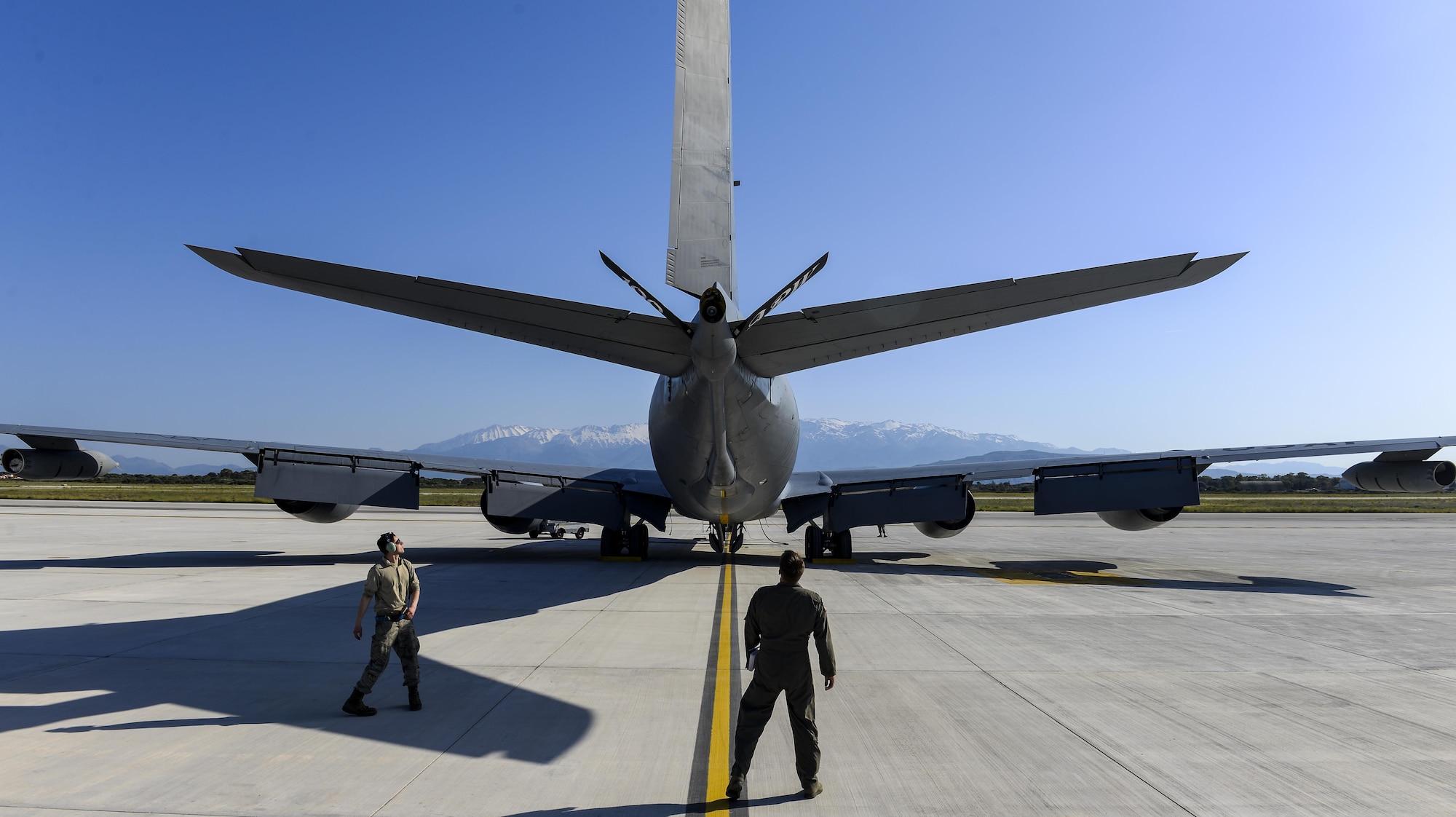 U.S. Air Force Capt. Bobby Stanford, 351st Air Refueling Squadron mission commander, and U.S. Air Force Staff Sgt. Joseph Flores, 100th Aircraft Maintenance Squadron flying crew chief, inspect a KC-135 Stratotanker May 3, 2017, at Naval Support Activity Souda Bay, Greece. As the mission commander, Stanford was in charge of two other aircraft during the refueling mission. (U.S. Air Force photo by Staff Sgt. Micaiah Anthony)