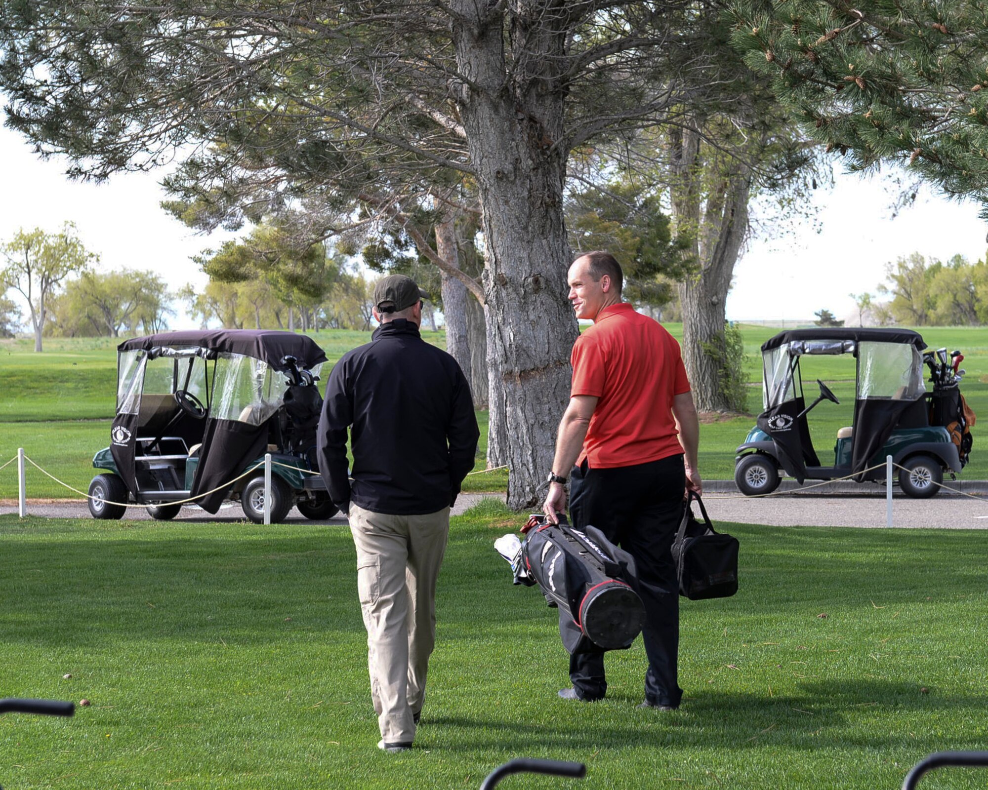 Brig. Gen. Richard Coe, Air Combat Command Inspector General and Col. Jefferson O’Donnell, 366th Fighter Wing commander talk as they prepare to play golf, May 6, 2017, at Mountain Home Air Force Base, Idaho. Coe visited MHAFB as part of a Gunfighter reunion. (U.S. Air Force photo by Senior Airman Jessica H. Smith/Released)