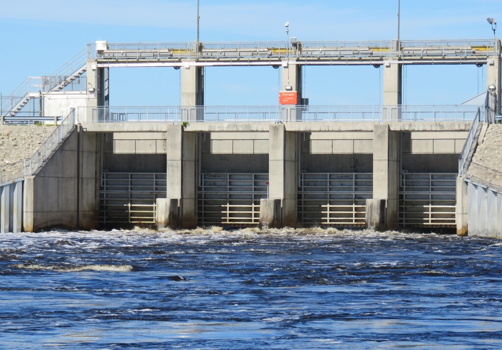 Water flows through the spillway gates at Moore Haven Lock & Dam in early 2016.  The U.S. Army Corps of Engineers has seen water levels in Lake Okeechobee go from one extreme to the other over the past year.