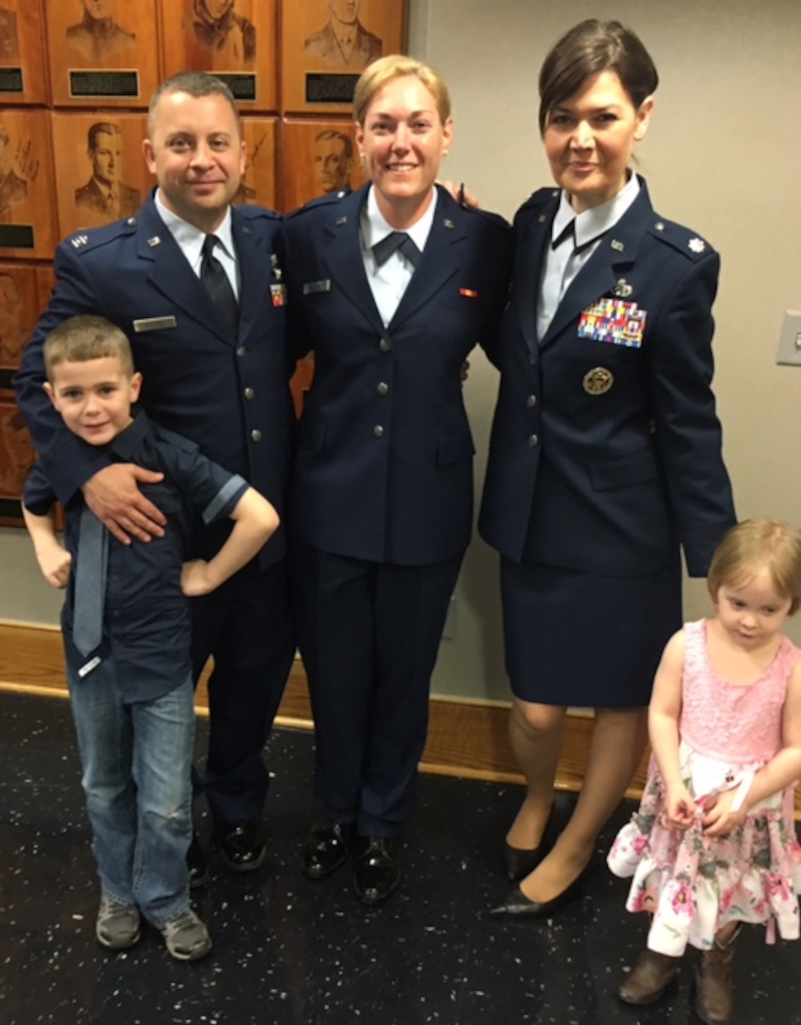 (Right) Lt. Col. Rebecca Lange, commander, 7th Intelligence Squadron, poses with Christie, (middle) wife of Capt. Samuel (left) from the 7th IS, 70th Intelligence, Surveillance and Reconnaissance Wing, at her graduation ceremony at Maxwell Air Force Base, Alabama in March. Christie, who has been a military spouse for the past 17 years, received her commission as a second lieutenant in the Space Operations career field. (Courtesy photo)