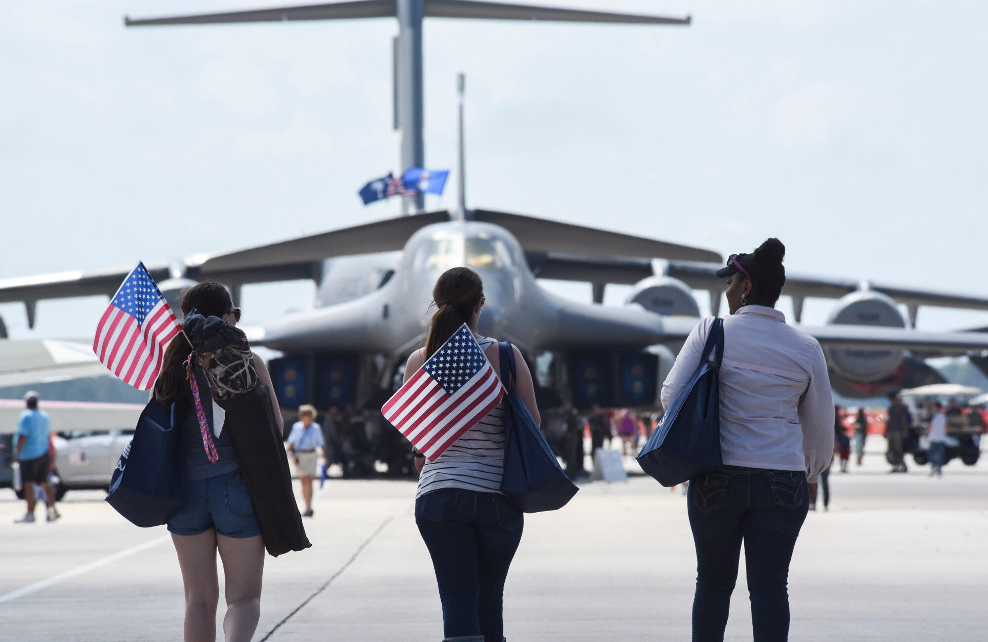 A group of patrons of the 2017 Gulf Coast Salute walk toward the B-1 Lancer static display at Tyndall Air Force Base, Fla., April 23, 2017. The B-1 was among many static display attractions during the air show paying homage to and informing visitors of aviation history. (U.S. Air Force photo by Senior Airman Solomon Cook/Released)

