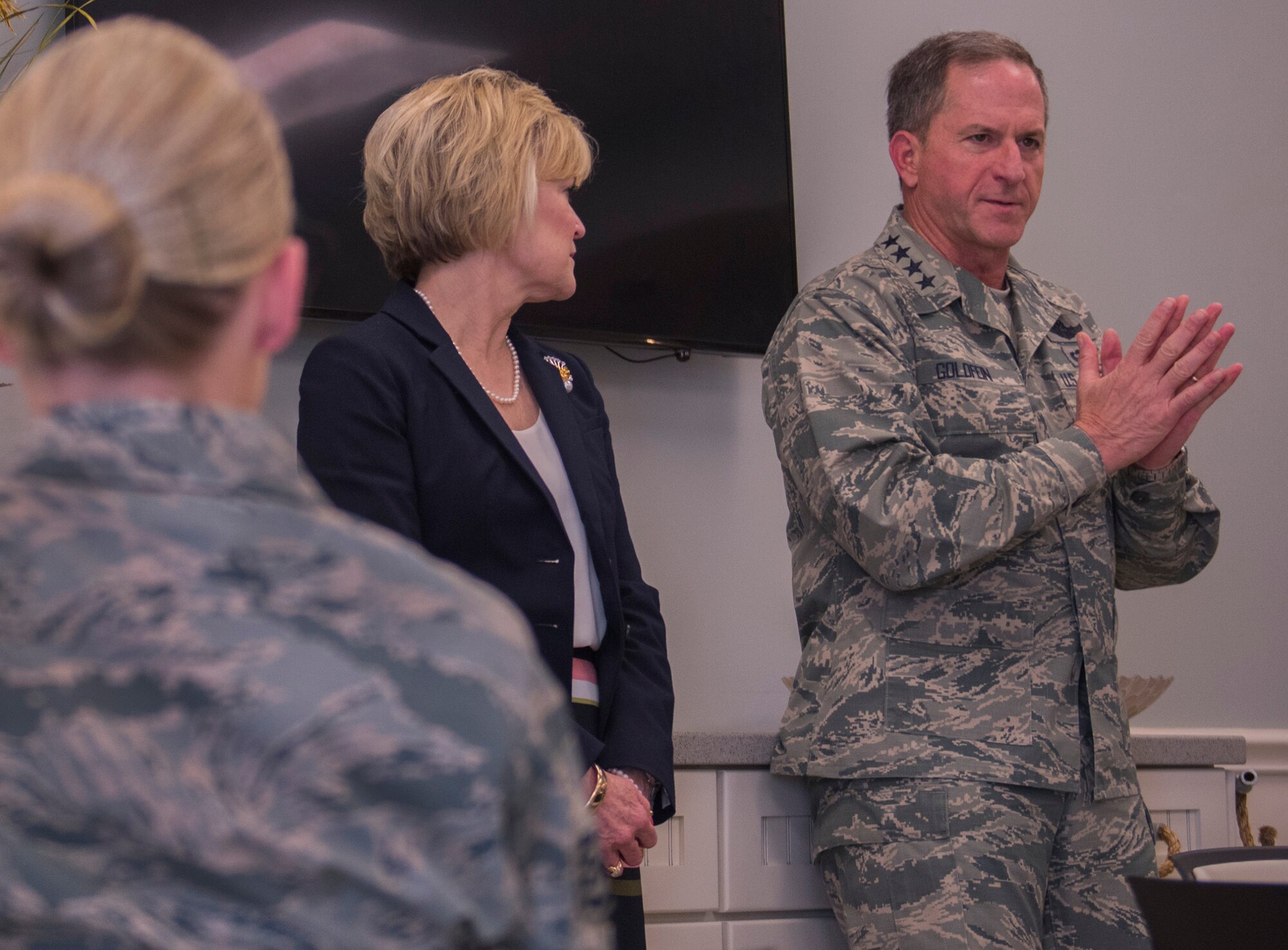 Air Force Chief of Staff Gen. David L. Goldfein and his spouse, Dawn, talk with junior Airmen during their visit to Eglin Air Force Base, Fla. May 9. The General and his spouse made brief remarks before taking questions from the Airmen and their spouses. The topics ranged from the F-35 to daycare. Goldfein also spoke about his combat experience as a fighter pilot. (U.S. Air Force photo/Ilka Cole) 