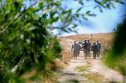 U.S. Army Reserve Soldiers conduct a 6.2-mile ruck march during the Best Warrior Competition hosted by the 79th SSC at Camp Pendleton, Calif., May 4, 2017. 

The U.S. Army Reserve's 79th Sustainment Support Command hosted their 2017 Best Warrior Competition at Camp Pendleton, Calif., May 3-6. The Best Warrior Competition seeks out the best candidate that defines a U.S. Army Soldier by testing Soldiers physically and mentally. The competition consisted of one enlisted Soldier and one noncommissioned officer from four separate one-star commands, which fall underneath the command and control of 79th SSC. At the conclusion, one Soldier and one NCO were named the 79th SSC Best Warriors and will represent the command in the U.S. Army Reserve Best Warrior Competition held at Fort Bragg, N.C., June 4-10, 2017. (U.S. Army photo by Sgt. Heather Doppke/released)