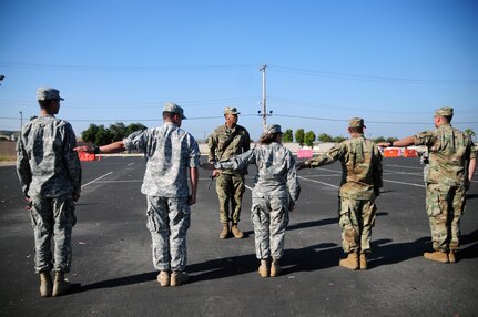 Spc. Charles Cherry, a paralegal specialist with the 79th Sustainment Support Command, aligns a group of Soldiers for a drill and ceremony event during the Best Warrior Competition hosted by the 79th SSC at Camp Pendleton, Calif., May 4, 2017. 

The U.S. Army Reserve's 79th Sustainment Support Command hosted their 2017 Best Warrior Competition at Camp Pendleton, Calif., May 3-6. The Best Warrior Competition seeks out the best candidate that defines a U.S. Army Soldier by testing Soldiers physically and mentally. The competition consisted of one enlisted Soldier and one noncommissioned officer from four separate one-star commands, which fall underneath the command and control of 79th SSC. At the conclusion, one Soldier and one NCO were named the 79th SSC Best Warriors and will represent the command in the U.S. Army Reserve Best Warrior Competition held at Fort Bragg, N.C., June 4-10, 2017. (U.S. Army photo by Sgt. Heather Doppke/released)