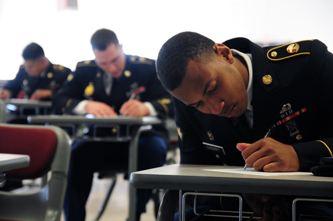 Spc. Charles Cherry, a paralegal specialist with the 79th Sustainment Support Command, writes an essay during the Best Warrior Competition hosted by the 79th Sustainment Support Command at Camp Pendleton, Calif., May 4, 2017. 

The U.S. Army Reserve's 79th Sustainment Support Command hosted their 2017 Best Warrior Competition at Camp Pendleton, Calif., May 3-6. The Best Warrior Competition seeks out the best candidate that defines a U.S. Army Soldier by testing Soldiers physically and mentally. The competition consisted of one enlisted Soldier and one noncommissioned officer from four separate one-star commands, which fall underneath the command and control of 79th SSC. At the conclusion, one Soldier and one NCO were named the 79th SSC Best Warriors and will represent the command in the U.S. Army Reserve Best Warrior Competition held at Fort Bragg, N.C., June 4-10, 2017. (U.S. Army photo by Sgt. Heather Doppke/released)