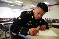 Spc. Kenny Ochoa, a watercraft operator with the 481st Transportation Company, writes an essay during the Best Warrior Competition hosted by the 79th Sustainment Support Command at Camp Pendleton, Calif., May 4, 2017. 

The U.S. Army Reserve's 79th Sustainment Support Command hosted their 2017 Best Warrior Competition at Camp Pendleton, Calif., May 3-6. The Best Warrior Competition seeks out the best candidate that defines a U.S. Army Soldier by testing Soldiers physically and mentally. The competition consisted of one enlisted Soldier and one noncommissioned officer from four separate one-star commands, which fall underneath the command and control of 79th SSC. At the conclusion, Ochoa was named one of the 79th SSC Best Warriors and will represent the command in the U.S. Army Reserve Best Warrior Competition held at Fort Bragg, N.C., June 4-10, 2017. (U.S. Army photo by Sgt. Heather Doppke/released)