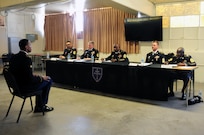 Spc. Charles Cherry, a paralegal specialist with the 79th Sustainment Support Command, sits at an appearance board during the Best Warrior Competition hosted by the 79th SSC at Camp Pendleton, Calif., May 4, 2017. 

The U.S. Army Reserve's 79th Sustainment Support Command hosted their 2017 Best Warrior Competition at Camp Pendleton, Calif., May 3-6. The Best Warrior Competition seeks out the best candidate that defines a U.S. Army Soldier by testing Soldiers physically and mentally. The competition consisted of one enlisted Soldier and one noncommissioned officer from four separate one-star commands, which fall underneath the command and control of 79th SSC. At the conclusion, one Soldier and one NCO were named the 79th SSC Best Warriors and will represent the command in the U.S. Army Reserve Best Warrior Competition held at Fort Bragg, N.C., June 4-10, 2017. (U.S. Army photo by Sgt. Heather Doppke/released)