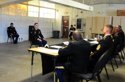 Spc. Daniel Kovitch, a motor transport operator with the 364th Expeditionary Sustainment Command, sits at an appearance board during the Best Warrior Competition hosted by the 79th SSC at Camp Pendleton, Calif., May 4, 2017. 

The U.S. Army Reserve's 79th Sustainment Support Command hosted their 2017 Best Warrior Competition at Camp Pendleton, Calif., May 3-6. The Best Warrior Competition seeks out the best candidate that defines a U.S. Army Soldier by testing Soldiers physically and mentally. The competition consisted of one enlisted Soldier and one noncommissioned officer from four separate one-star commands, which fall underneath the command and control of 79th SSC. At the conclusion, one Soldier and one NCO were named the 79th SSC Best Warriors and will represent the command in the U.S. Army Reserve Best Warrior Competition held at Fort Bragg, N.C., June 4-10, 2017. (U.S. Army photo by Sgt. Heather Doppke/released)