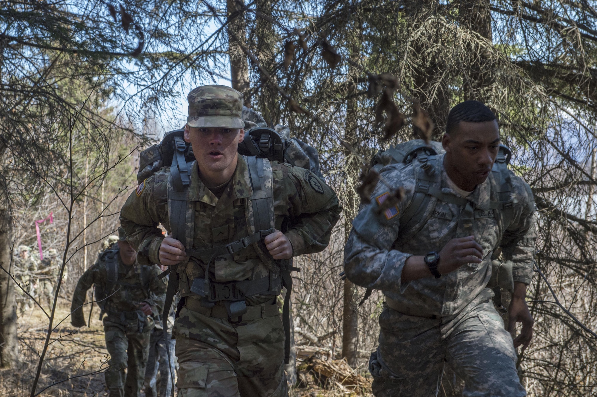 Joint Base Elmendorf-Richardson service members participate in the Combat Cross Country Trail Run at Otter Lake, JBER, Alaska, May 5, 2017. During the event, nine teams of five ran approximately three miles around the lake with 35-pound ruck-sacks. The team representing the 4th Quartermaster Company, 725th Brigade Support Battalion (Airborne), 4th Infantry Brigade Combat Team (Airborne), 25th Infantry Division, U.S. Army Alaska, received first place. 