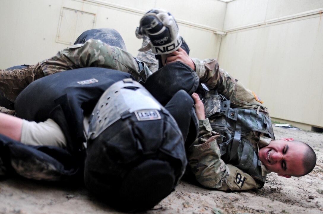 Sgt. Carlos Garcia Velasquez, a human resources specialist with the 90th Sustainment Brigade, subdues a "high value target" during the Best Warrior Competition hosted by the 79th SSC at Camp Pendleton, Calif., May 5, 2017. 

The U.S. Army Reserve's 79th Sustainment Support Command hosted their 2017 Best Warrior Competition at Camp Pendleton, Calif., May 3-6. The Best Warrior Competition seeks out the best candidate that defines a U.S. Army Soldier by testing Soldiers physically and mentally. The competition consisted of one enlisted Soldier and one noncommissioned officer from four separate one-star commands, which fall underneath the command and control of 79th SSC. At the conclusion, one Soldier and one NCO were named the 79th SSC Best Warriors and will represent the command in the U.S. Army Reserve Best Warrior Competition held at Fort Bragg, N.C., June 4-10, 2017. (U.S. Army photo by Sgt. Heather Doppke/released)