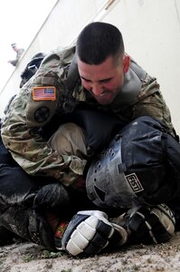 Staff Sgt. Kenneth Chefan, a transportation management coordinator with the 535th Movement Control Team, subdues a "high value target" during the Best Warrior Competition hosted by the 79th SSC at Camp Pendleton, Calif., May 5, 2017. 

The U.S. Army Reserve's 79th Sustainment Support Command hosted their 2017 Best Warrior Competition at Camp Pendleton, Calif., May 3-6. The Best Warrior Competition seeks out the best candidate that defines a U.S. Army Soldier by testing Soldiers physically and mentally. The competition consisted of one enlisted Soldier and one noncommissioned officer from four separate one-star commands, which fall underneath the command and control of 79th SSC. At the conclusion, Chetan was named one of the 79th SSC Best Warriors and will represent the command in the U.S. Army Reserve Best Warrior Competition held at Fort Bragg, N.C., June 4-10, 2017. (U.S. Army photo by Sgt. Heather Doppke/released)