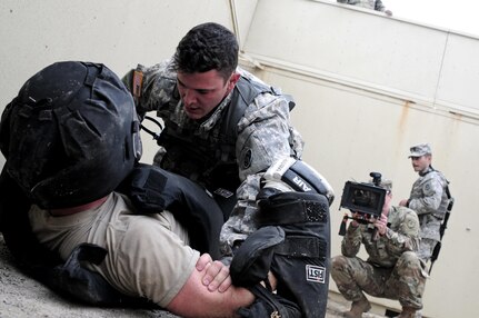 Spc. Mitchell Willyard, a human resources specialist with the 620th Combat Sustainment Support Battalion, subdues a "high value target" during the Best Warrior Competition hosted by the 79th SSC at Camp Pendleton, Calif., May 5, 2017. 

The U.S. Army Reserve's 79th Sustainment Support Command hosted their 2017 Best Warrior Competition at Camp Pendleton, Calif., May 3-6. The Best Warrior Competition seeks out the best candidate that defines a U.S. Army Soldier by testing Soldiers physically and mentally. The competition consisted of one enlisted Soldier and one noncommissioned officer from four separate one-star commands, which fall underneath the command and control of 79th SSC. At the conclusion, one Soldier and one NCO were named the 79th SSC Best Warriors and will represent the command in the U.S. Army Reserve Best Warrior Competition held at Fort Bragg, N.C., June 4-10, 2017. (U.S. Army photo by Sgt. Heather Doppke/released)