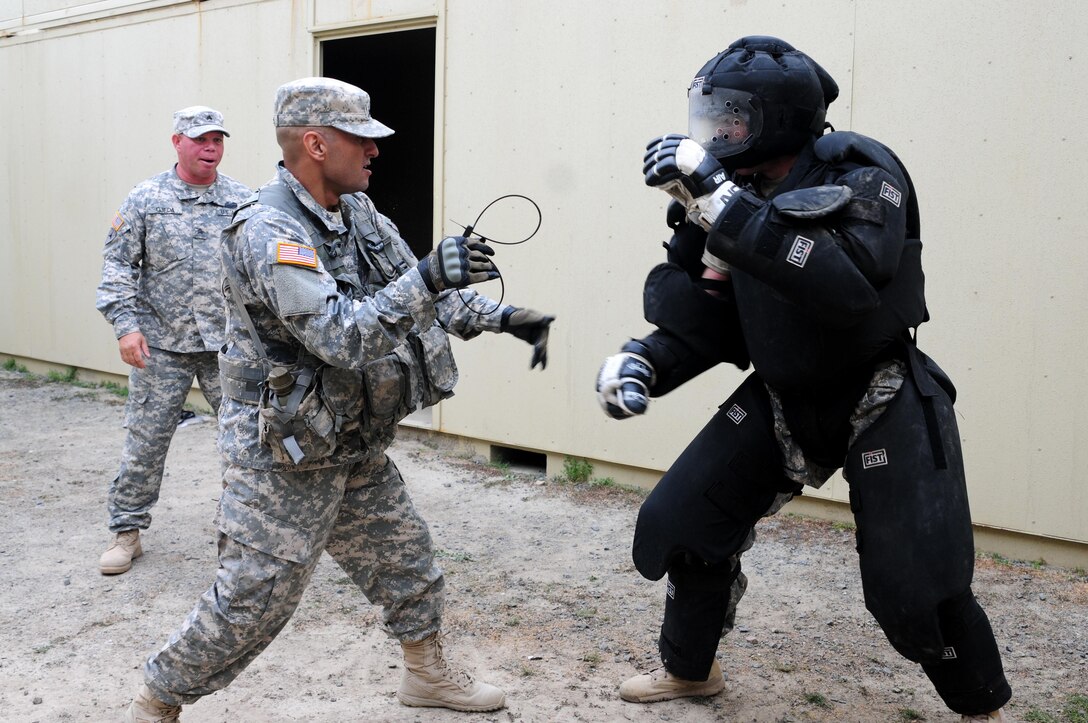 Sgt. Felix Garcia, a financial management technician with the 311th Expeditionary Sustainment Command, subdues a "high value target" during the Best Warrior Competition hosted by the 79th SSC at Camp Pendleton, Calif., May 5, 2017. 

The U.S. Army Reserve's 79th Sustainment Support Command hosted their 2017 Best Warrior Competition at Camp Pendleton, Calif., May 3-6. The Best Warrior Competition seeks out the best candidate that defines a U.S. Army Soldier by testing Soldiers physically and mentally. The competition consisted of one enlisted Soldier and one noncommissioned officer from four separate one-star commands, which fall underneath the command and control of 79th SSC. At the conclusion, one Soldier and one NCO were named the 79th SSC Best Warriors and will represent the command in the U.S. Army Reserve Best Warrior Competition held at Fort Bragg, N.C., June 4-10, 2017. (U.S. Army photo by Sgt. Heather Doppke/released)