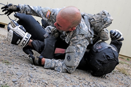 Sgt. Felix Garcia, a financial management technician with the 311th Expeditionary Sustainment Command, subdues a "high value target" during the Best Warrior Competition hosted by the 79th SSC at Camp Pendleton, Calif., May 5, 2017. 

The U.S. Army Reserve's 79th Sustainment Support Command hosted their 2017 Best Warrior Competition at Camp Pendleton, Calif., May 3-6. The Best Warrior Competition seeks out the best candidate that defines a U.S. Army Soldier by testing Soldiers physically and mentally. The competition consisted of one enlisted Soldier and one noncommissioned officer from four separate one-star commands, which fall underneath the command and control of 79th SSC. At the conclusion, one Soldier and one NCO were named the 79th SSC Best Warriors and will represent the command in the U.S. Army Reserve Best Warrior Competition held at Fort Bragg, N.C., June 4-10, 2017. (U.S. Army photo by Sgt. Heather Doppke/released)