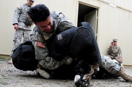 Spc. Kenny Ochoa, a watercraft operator with the 481st Transportation Company, subdues a "high value target" during the Best Warrior Competition hosted by the 79th SSC at Camp Pendleton, Calif., May 5, 2017. 

The U.S. Army Reserve's 79th Sustainment Support Command hosted their 2017 Best Warrior Competition at Camp Pendleton, Calif., May 3-6. The Best Warrior Competition seeks out the best candidate that defines a U.S. Army Soldier by testing Soldiers physically and mentally. The competition consisted of one enlisted Soldier and one noncommissioned officer from four separate one-star commands, which fall underneath the command and control of 79th SSC. At the conclusion, Ochoa was named one of the 79th SSC Best Warriors and will represent the command in the U.S. Army Reserve Best Warrior Competition held at Fort Bragg, N.C., June 4-10, 2017. (U.S. Army photo by Sgt. Heather Doppke/released)