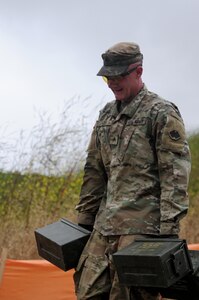 Sgt. Brandon Blue, a horizontal construction engineer with the 786th Quartermaster Company, carries ammo cans during the 5k challenge event of the Best Warrior Competition hosted by the 79th SSC at Camp Pendleton, Calif., May 6, 2017. 

The U.S. Army Reserve's 79th Sustainment Support Command hosted their 2017 Best Warrior Competition at Camp Pendleton, Calif., May 3-6. The Best Warrior Competition seeks out the best candidate that defines a U.S. Army Soldier by testing Soldiers physically and mentally. The competition consisted of one enlisted Soldier and one noncommissioned officer from four separate one-star commands, which fall underneath the command and control of 79th SSC. At the conclusion, one Soldier and one NCO were named the 79th SSC Best Warriors and will represent the command in the U.S. Army Reserve Best Warrior Competition held at Fort Bragg, N.C., June 4-10, 2017. (U.S. Army photo by Sgt. Heather Doppke/released)