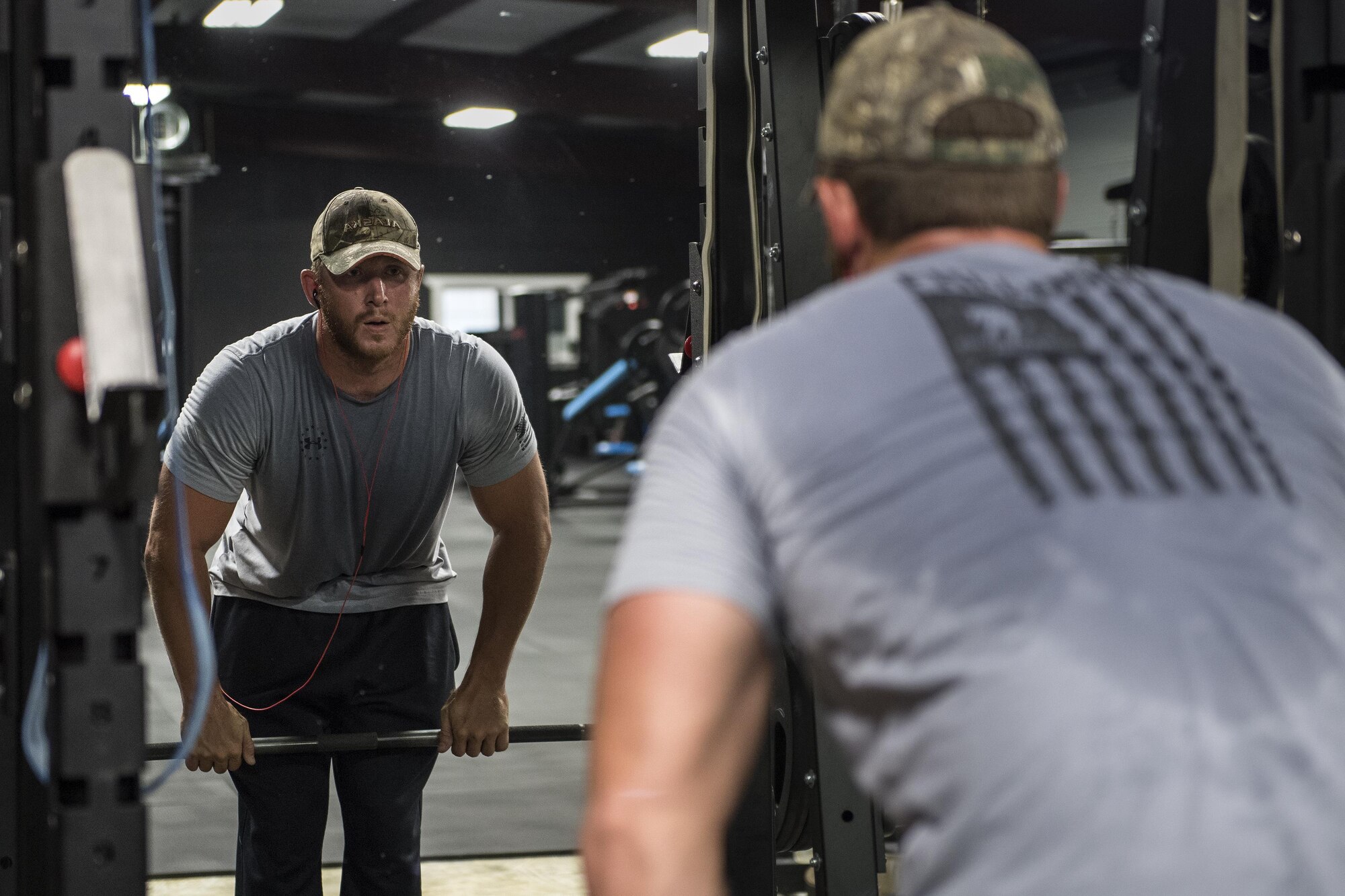 Staff Sgt. Nicholas Worley, 23d Civil Engineer Squadron electrical systems craftsman, pauses during a workout, April 18, 2017, in Valdosta, Ga. In January 2012 Worley was diagnosed with Chronic Myelogenous Leukemia, an uncommon form of blood-cell cancer that starts in the blood-forming bone marrow cells. He’s currently in remission and goes to the cancer center every three months to ensure his treatment is still working. “The gym plays a major part in my remission status because I can see my body progressing and getting stronger and I know I’m not feeling sick,” said Worley.  (U.S. Air Force Photo by Senior Airman Janiqua P. Robinson)