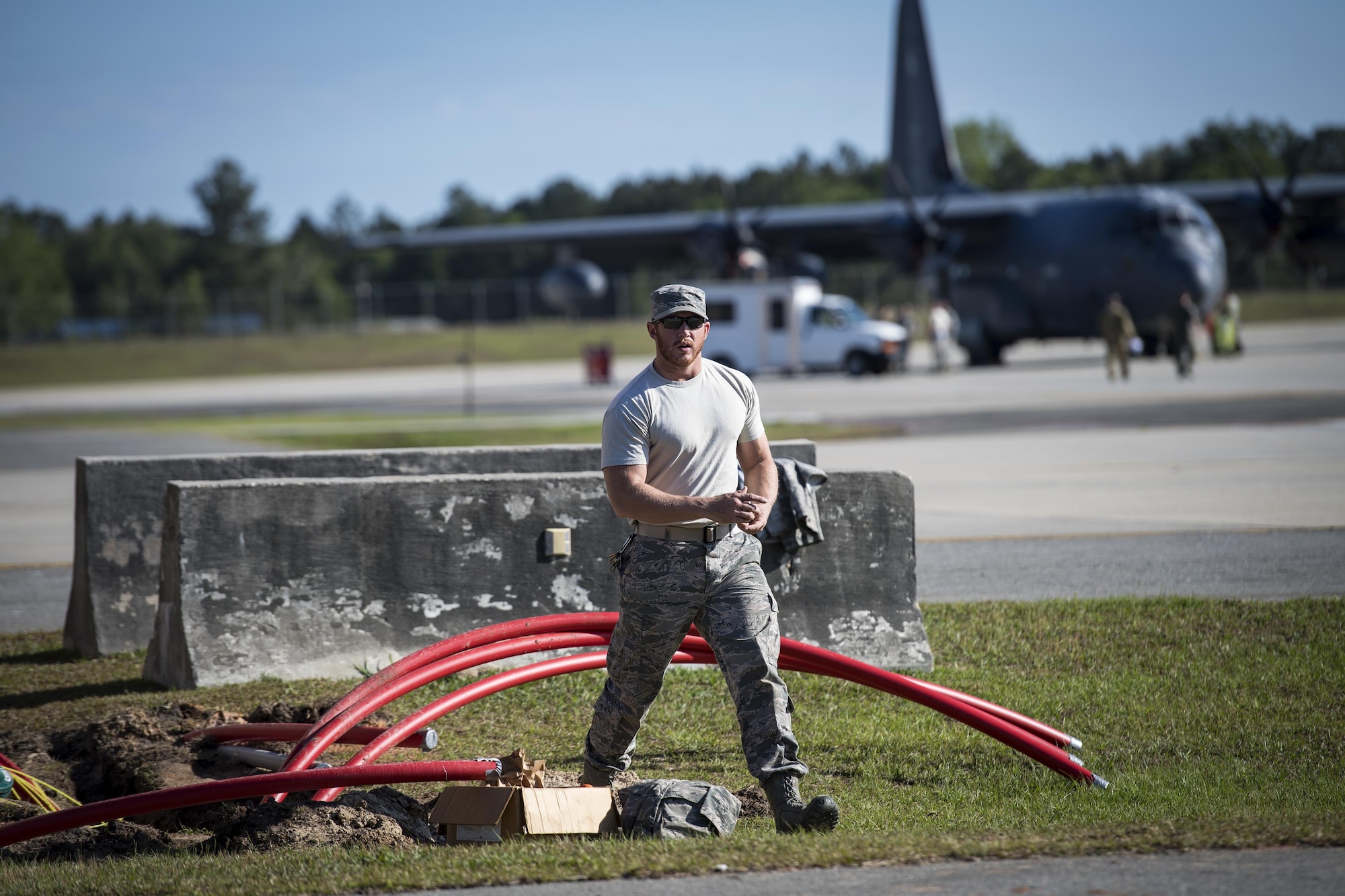 Staff Sgt. Nicholas Worley, 23d Civil Engineer Squadron electrical systems craftsman, walks across the flightline after remarking wires, April 13, 2017, at Moody Air Force Base, Ga. In January 2012, Worley was diagnosed with Chronic Myelogenous Leukemia, an uncommon form of blood-cell cancer that starts in the blood-forming bone marrow cells. He’s currently in remission and goes to the cancer center every three months to ensure his treatment is still working. (U.S. Air Force Photo by Senior Airman Janiqua P. Robinson)