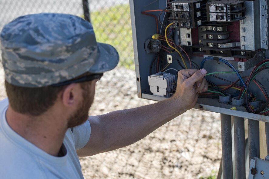 Staff Sgt. Nicholas Worley, 23d Civil Engineer Squadron electrical systems craftsman, grasps wires in an electrical box, April 13, 2017, at Moody Air Force Base, Ga. In January 2012 Worley was diagnosed with Chronic Myelogenous Leukemia, an uncommon form of blood-cell cancer that starts in the blood-forming bone marrow cells. He’s currently in remission and goes to the cancer center every three months to ensure his treatment is still working. (U.S. Air Force Photo by Senior Airman Janiqua P. Robinson)
