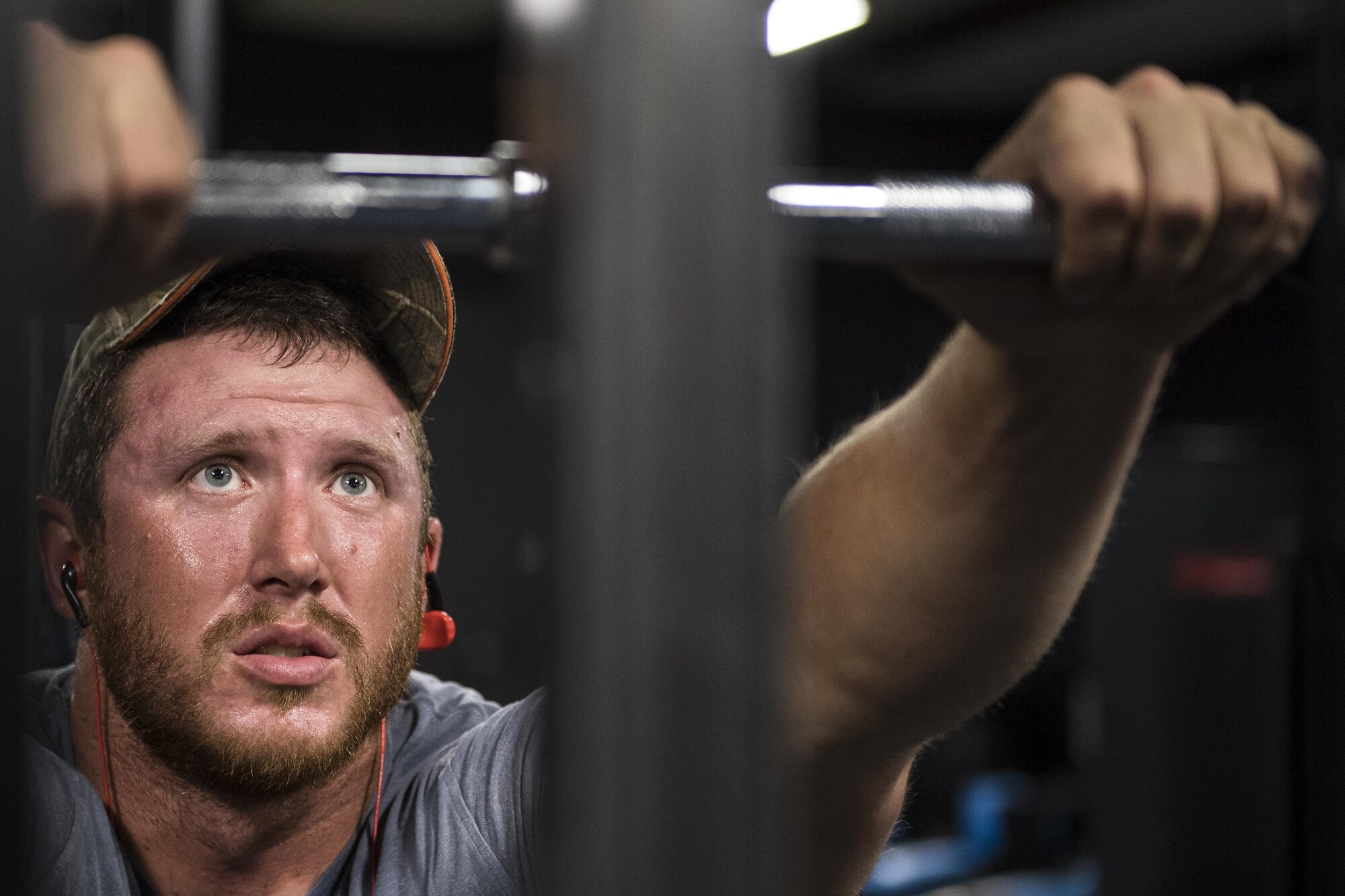Staff Sgt. Nicholas Worley, 23d Civil Engineer Squadron electrical systems craftsman, pauses during a workout, April 18, 2017, in Valdosta, Ga. In January 2012 Worley was diagnosed with Chronic Myelogenous Leukemia, an uncommon form of blood-cell cancer that starts in the blood-forming bone marrow cells. He’s currently in remission and goes to the cancer center every three months to ensure his treatment is still working. “The gym plays a major part in my remission status because I can see my body progressing and getting stronger and I know I’m not feeling sick,” said Worley. (U.S. Air Force Photo by Senior Airman Janiqua P. Robinson)