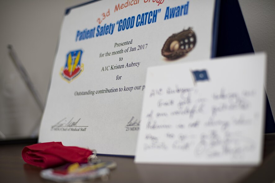 Medical technicians are normally the first to see a patient, leaving it to them to assess if someone is simply sick or should be in an emergency room. After recognizing a patient with life-threatening symptoms, Senior Airman Kristen Aubrey, 23d Medical Operations Squadron aerospace medical technician, was honored for quickly responding to a potentially dire situation. (U.S. Air Force photo by Airman 1st Class Daniel Snider)
