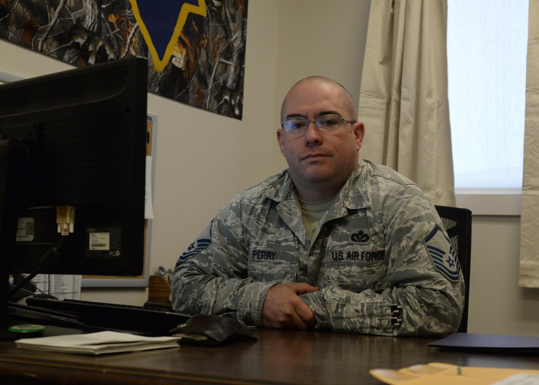 U.S. Air Force Master Sgt. Brian Perry, 7th Civil Engineer Squadron infrastructure section chief, received aid from the Air Force Assistance Fund as a young Airman when the engine in his truck failed. The financial aid was able to help Perry replace the engine in his vehicle, so he could continue supporting the mission. The Air Force Assistance Fund helps more than 57,000 individuals each year. (U.S. Air Force Photo by Airman 1st Class Rebecca Van Syoc)