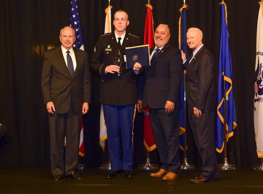 Army Sgt. Michael Hamilton is awarded the active-duty Soldier of the year at the Armed Forces Recognition Luncheon May 5, 2017, at the DoubleTree by Hilton in Denver. The AFRL is an annual event hosted by the Aurora Chamber of Commerce in appreciation of Colorado’s active-duty, guardsmen and reservists. (U.S. Air Force photo by Airman Jacob Deatherage/Released)