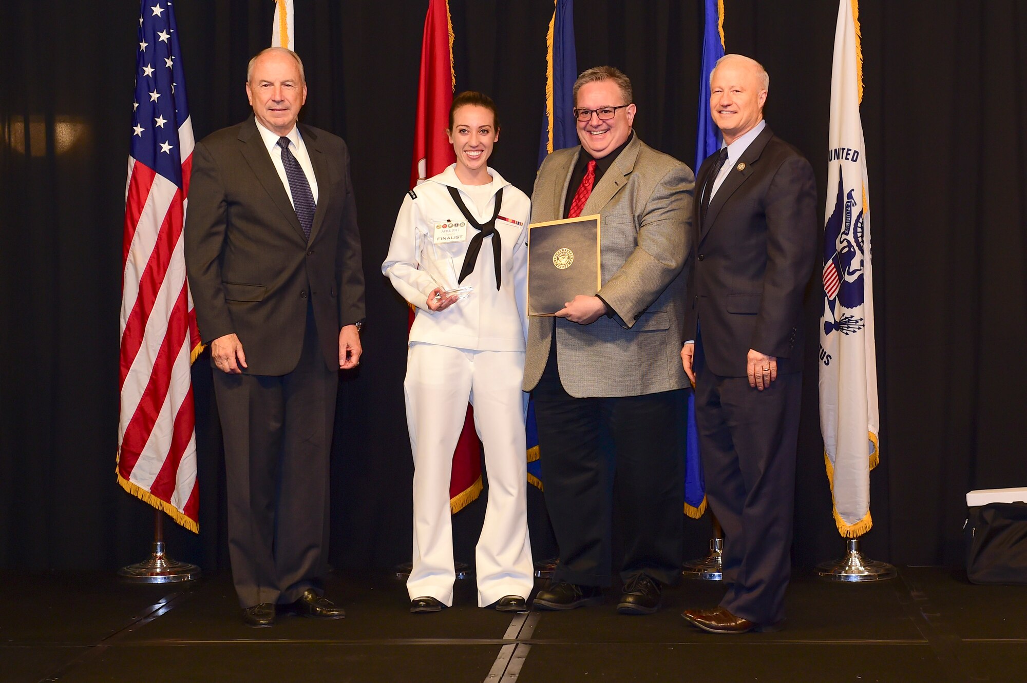 Petty Officer 3rd Class Marley Shafer is awarded the reservist Sailor of the year at the Armed Forces Recognition Luncheon May 5, 2017, at the DoubleTree by Hilton in Denver. The AFRL is an annual event hosted by the Aurora Chamber of Commerce in appreciation of Colorado’s active-duty, guardsmen and reservists. (U.S. Air Force photo by Airman Jacob Deatherage/Released)