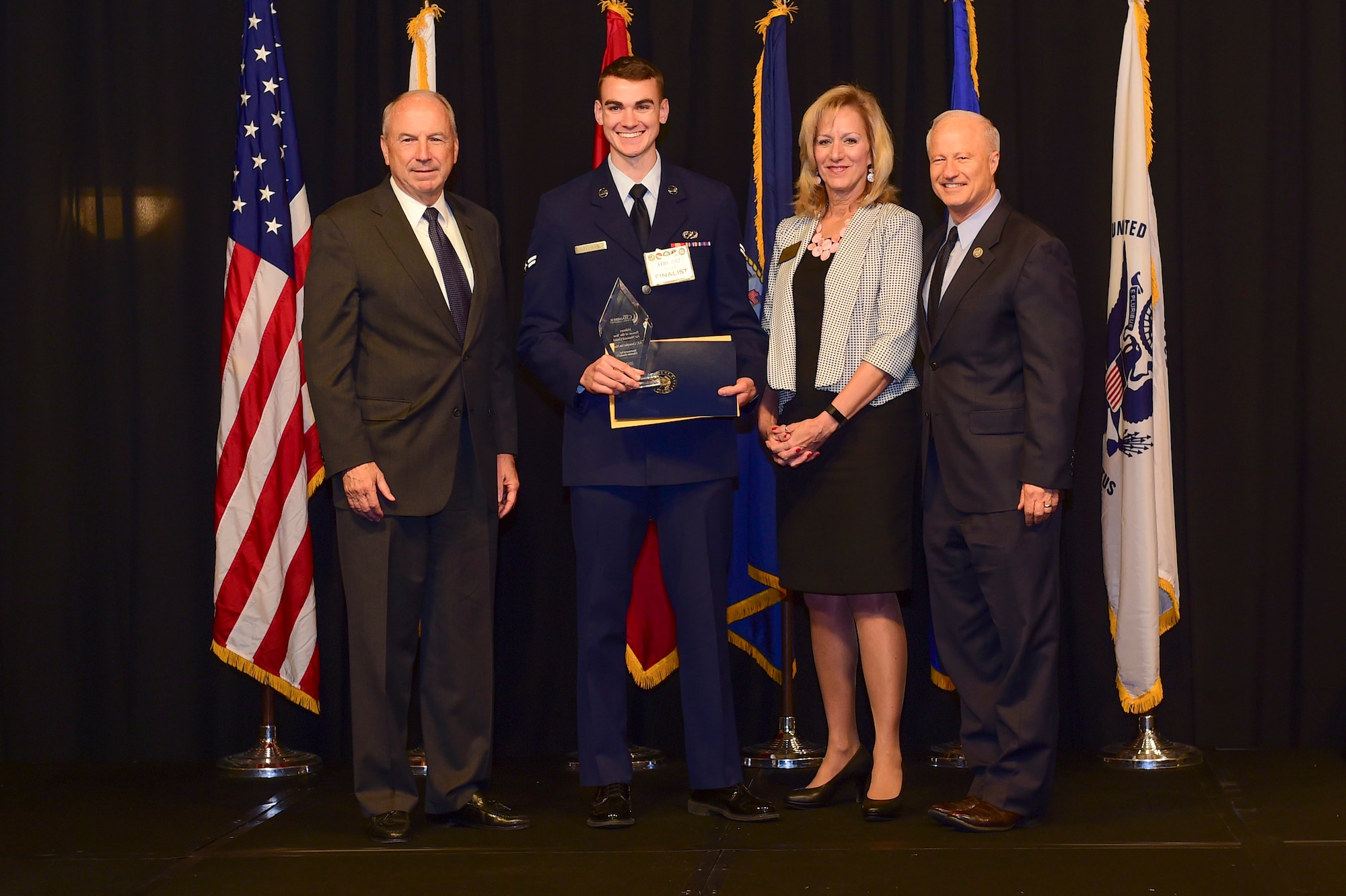 Airman 1st Class Christopher Von Haasl is awarded the Colorado National Guard Airman of the year at the Armed Forces Recognition Luncheon May 5, 2017, at the DoubleTree by Hilton in Denver. The AFRL is an annual event hosted by the Aurora Chamber of Commerce in appreciation of Colorado’s active-duty, guardsmen and reservists. (U.S. Air Force photo by Airman Jacob Deatherage/Released)
