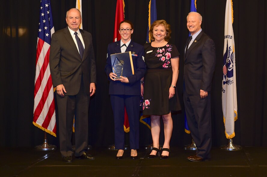 Staff Sgt. Krystal Eisenhauer is awarded the reservist Airman of the year at the Armed Forces Recognition Luncheon May 5, 2017, at the DoubleTree by Hilton in Denver. The AFRL is an annual event hosted by the Aurora Chamber of Commerce in appreciation of Colorado’s active-duty, guardsmen and reservists. (U.S. Air Force photo by Airman Jacob Deatherage/Released)