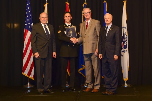 Master Seaman Ian McDonald is awarded the Commonwealth Partner of the year at the Armed Forces Recognition Luncheon May 5, 2017, at the DoubleTree by Hilton in Denver. The AFRL is an annual event hosted by the Aurora Chamber of Commerce in appreciation of Colorado’s active-duty, guardsmen and reservists. (U.S. Air Force photo by Airman Jacob Deatherage/Released)