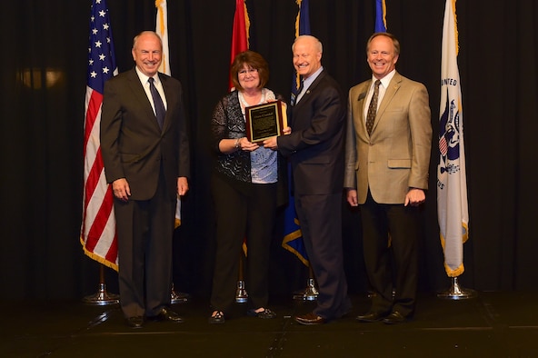 Diane Crandall is presented the Cardenas Award at the Armed Forces Recognition Luncheon May 5, 2017, at the DoubleTree by Hilton in Denver. The Cardenas Award is an award given to the year’s outstanding military supporter. (U.S. Air Force photo by Airman Jacob Deatherage/Released)