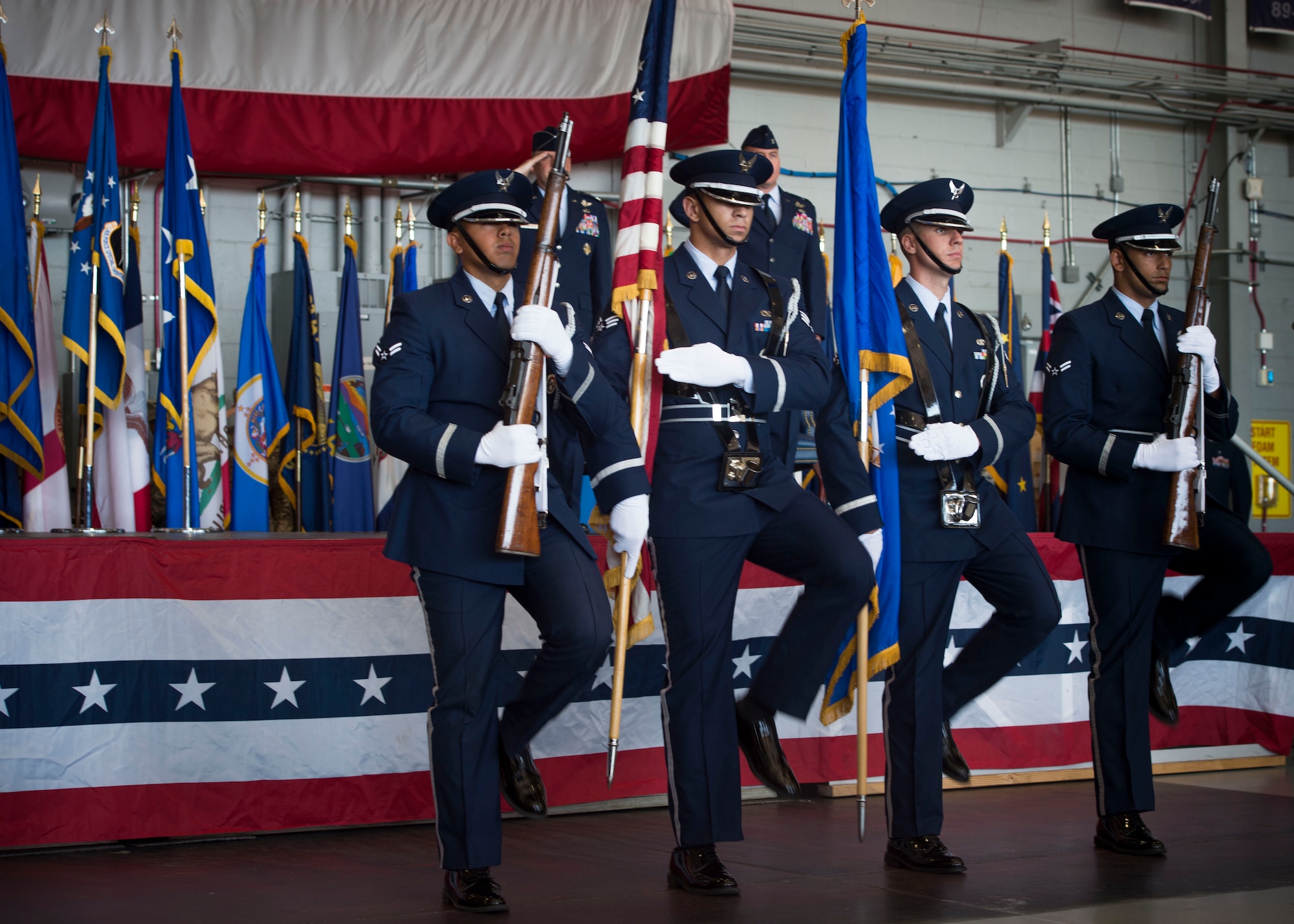 The Hurlburt Field Honor Guard presents the colors during a ceremony to deactivate Air Force Special Operations Air Warfare Center and activate the 492nd Special Operations Wing at Hurlburt Field, Fla., May 10, 2017. The Air Force Special Operations Air Warfare Center was inactivated and the 492nd SOW was activated. Simultaneously, the 492nd Special Operations Group and the 492nd Special Operations Training Group were activated under the 492nd SOW. (U.S. Air Force photo by Senior Airman Krystal M. Garrett)