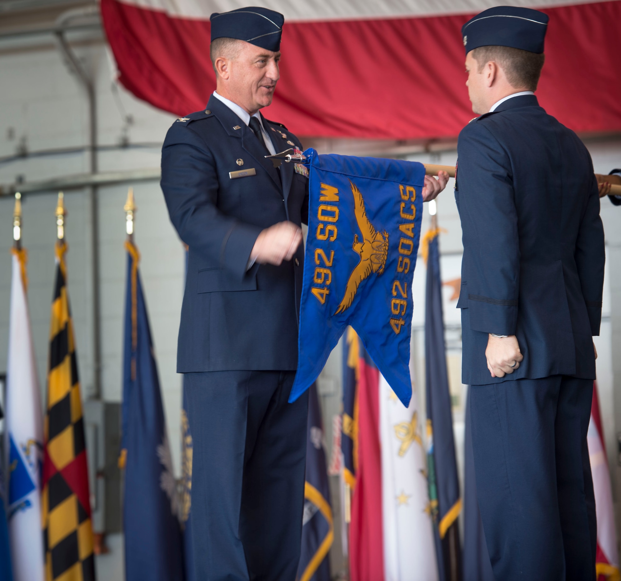 Col. Nathan Green, commander of the 492nd Special Operations Wing, activates the 492nd Special Operations Advanced Capability Squadron during an activation ceremony at Hurlburt Field, Fla., May 10, 2017. Green appointed Lt. Col. Matthew Laurentz to command the 492nd SOACS. (U.S. Air Force photo by Senior Airman Krystal M. Garrett)