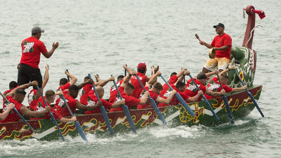 The Single Marine Program’s dragon boat team paddles during the 43rd Naha Harii Festival dragon boat race in Naha City, Japan, May 5, 2017. Marine Corps photo from Lance Cpl. Danielle Prentice