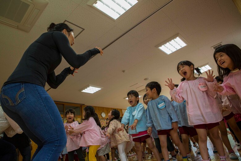 U.S. Marine Corps Lance Cpl. Da Hee Park, a volunteer with the Marine Memorial Chapel, pretends to be a tiger with Josho Hoikuen Preschool students during a community relations event in Iwakuni City, Japan, May 9, 2017. Volunteering at the preschool helped the relationship between Marine Corps Air Station Iwakuni residents and the local community grow stronger. Introductions were given by the volunteers while students asked them questions, then the children were introduced to “The Hokey Pokey” and “Head, Shoulders, Knees and Toes” before playing educational games with the volunteers. (U.S. Marine Corps photo by Lance Cpl. Gabriela Garcia-Herrera)