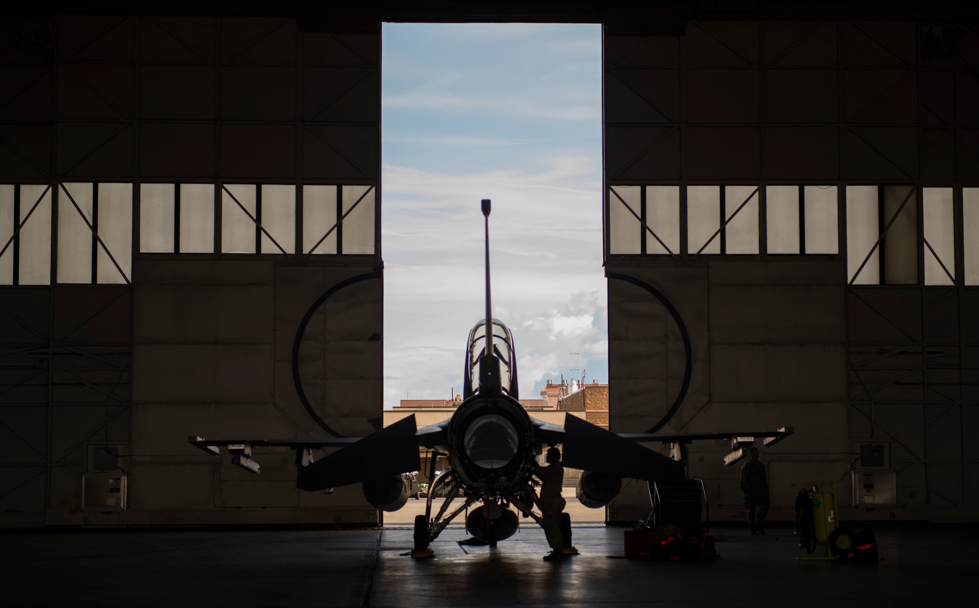 U.S. Air Force Airman 1st Class Eric Baltazar a 13th Fighter Squadron avionics technicians, performs preflight inspections during Northern Edge 2017 at Eielson Air Force Base, Alaska, May 9, 2017. NE17 is a training exercise that provides effective, flexible and capabilities-centered joint forces ready for deployment worldwide and enables real-world proficiency in detection, identification and tracking. (U.S. Air Force photo by Tech Sgt. Araceli Alarcon)