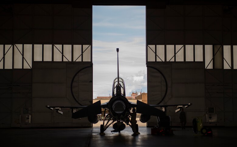 U.S. Air Force Airman 1st Class Eric Baltazar a 13th Fighter Squadron avionics technicians, performs preflight inspections during Northern Edge 2017 at Eielson Air Force Base, Alaska, May 9, 2017. NE17 is a training exercise that provides effective, flexible and capabilities-centered joint forces ready for deployment worldwide and enables real-world proficiency in detection, identification and tracking. (U.S. Air Force photo by Tech Sgt. Araceli Alarcon)