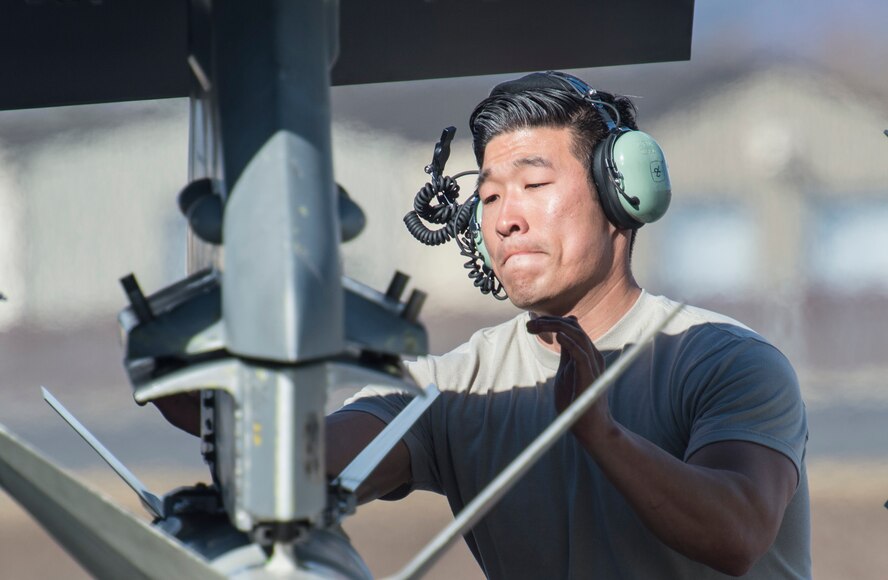 U.S. Air Force Staff Sgt. David Roh, a 13th Aircraft Maintenance Unit weapons technician, stationed at Misawa Air Base, Japan, inspects a weapon system prior to take-off during Northern Edge 2017 at Eielson Air Force Base, Alaska, May 6, 2017. NE17 provides Airmen from Misawa AB the ability to sharpen their skills, practice operations, techniques and procedures, while continuing to demonstrate their commitment to the Indo-Asia-Pacific region. (U.S. Air Force photo by Tech. Sgt. Araceli Alarcon)