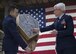 Capt. Brad Palm, 434th Maintenance Squadron accessories flight commander, presents Col. Anna Schulte, 434th Maintenance Group commander, with a shadow box he built during her retirement ceremony at Grissom Air Reserve Base, Ind., April 1, 2017. Schulte, who had been the commander of the 434th Maintenance Group for over three years, was responsible for the largest KC-135R Stratotanker unit in the Air Force Reserve Command. (U.S. Air Force photo/Staff Sgt. Katrina Heikkinen)