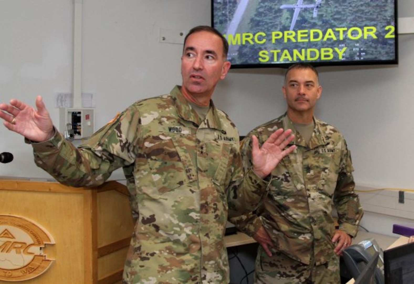 Maj. Gen. David Wood, commanding general, 38th Infantry Division, and Sgt. Maj. James Martin, command sergeant major, 38th Infantry Division, visit the operations center during Saber Junction 17 at the Joint Multinational Readiness Center, Hohenfels, Germany May 4, 2017.