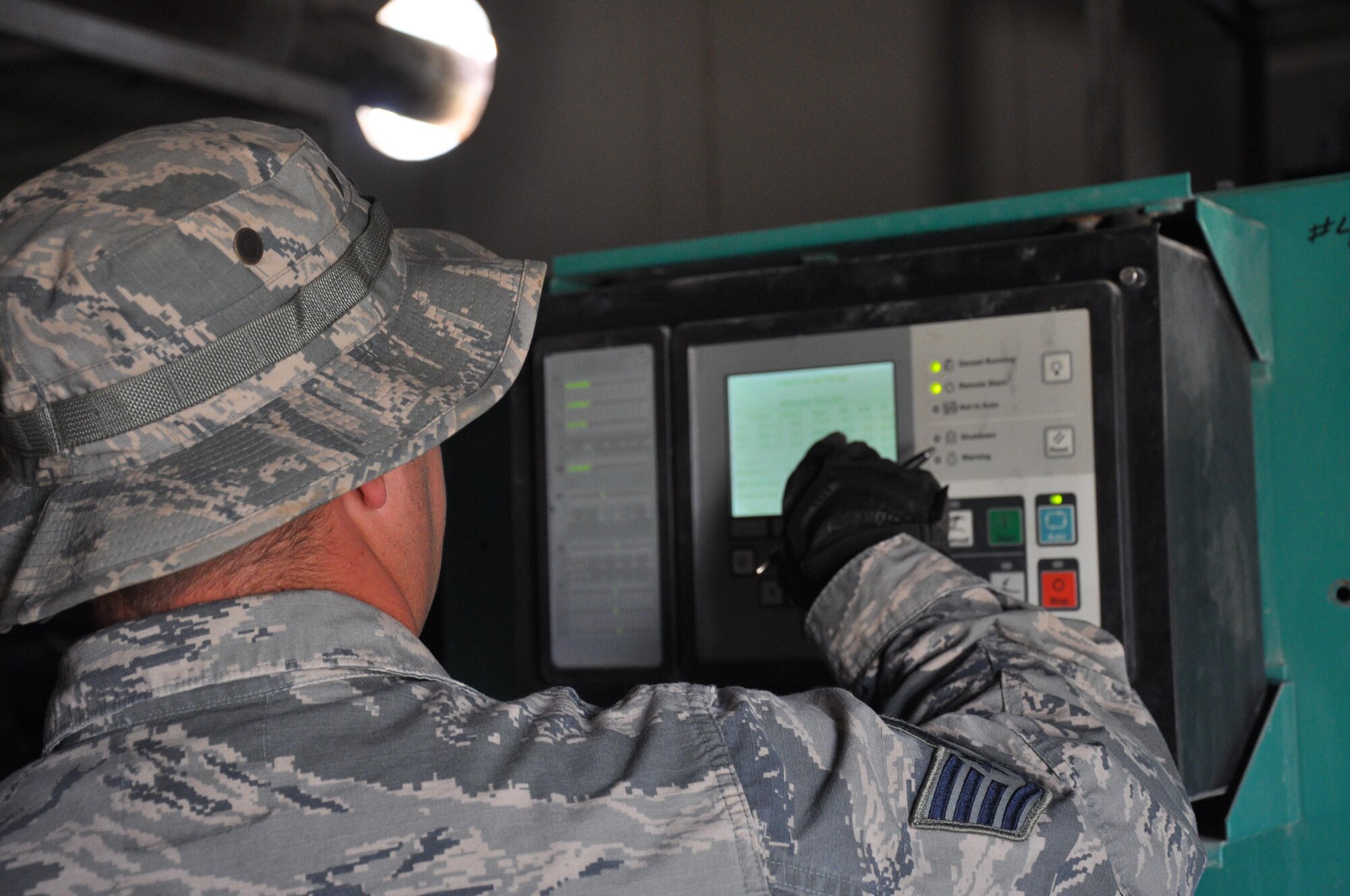 Staff Sgt. Jason D. Clinch, a generator maintenance program manager with the 386th Expeditionary Civil Engineer Squadron, adjusts power generator settings during a preventative maintenance check Wednesday May 10, 2017, at an undisclosed location in Southwest Asia. The power generator serves as a supplement to the host nation electrical grid. Staff Sergeant Clinch is deployed from the 30th Space Wing, Vandenberg Air Force Base, Calif.