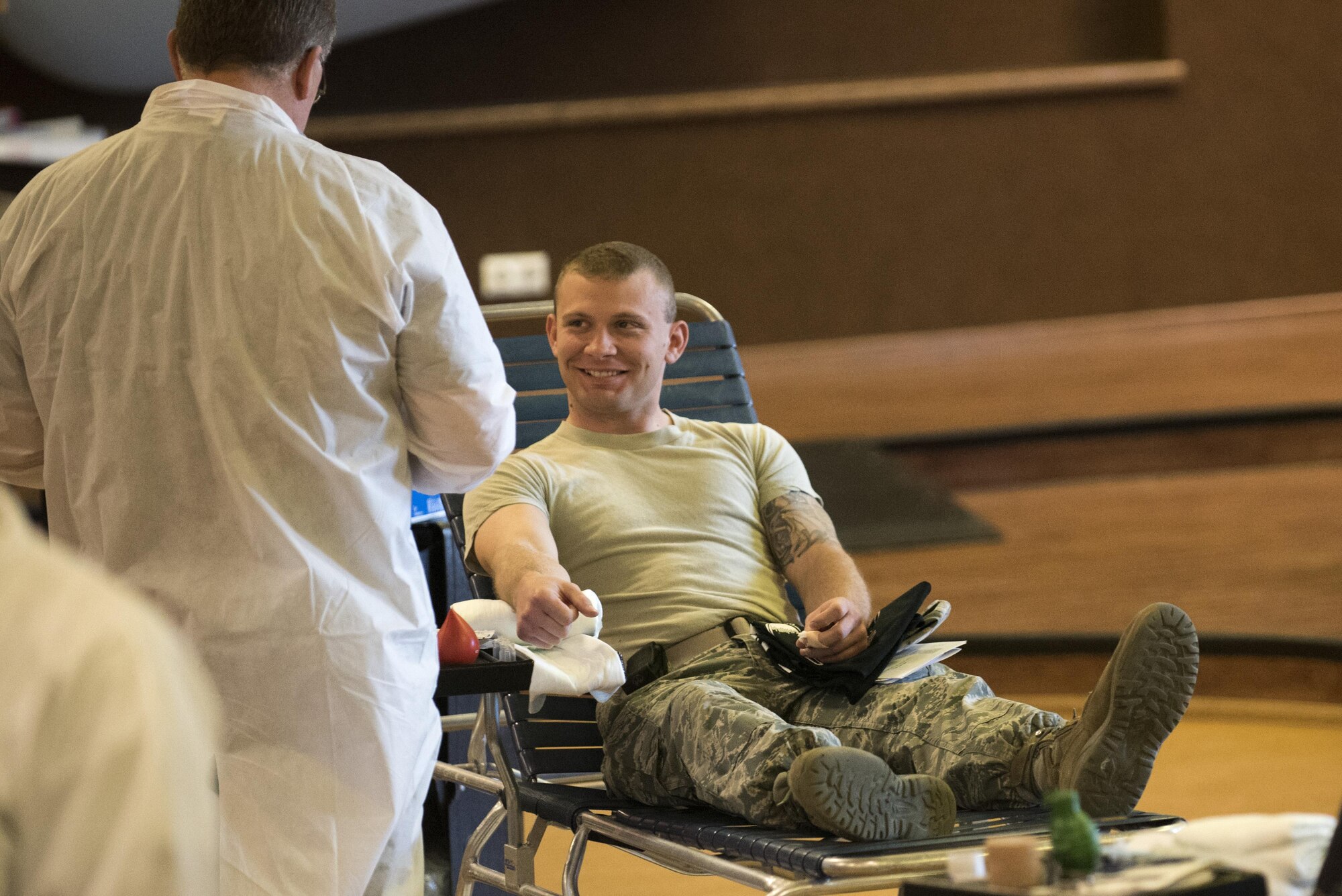 U.S. Air Force Senior Airman Allen Turner, 52nd Civil Engineer Squadron heavy equipment operator, donates blood during an Armed Services Blood Program blood drive in the Brick House at Spangdahlem Air Base, Germany, May 10, 2017. The ASBP supplies blood and blood products for 1.3 million service members and their families across the nation and around the globe every year.