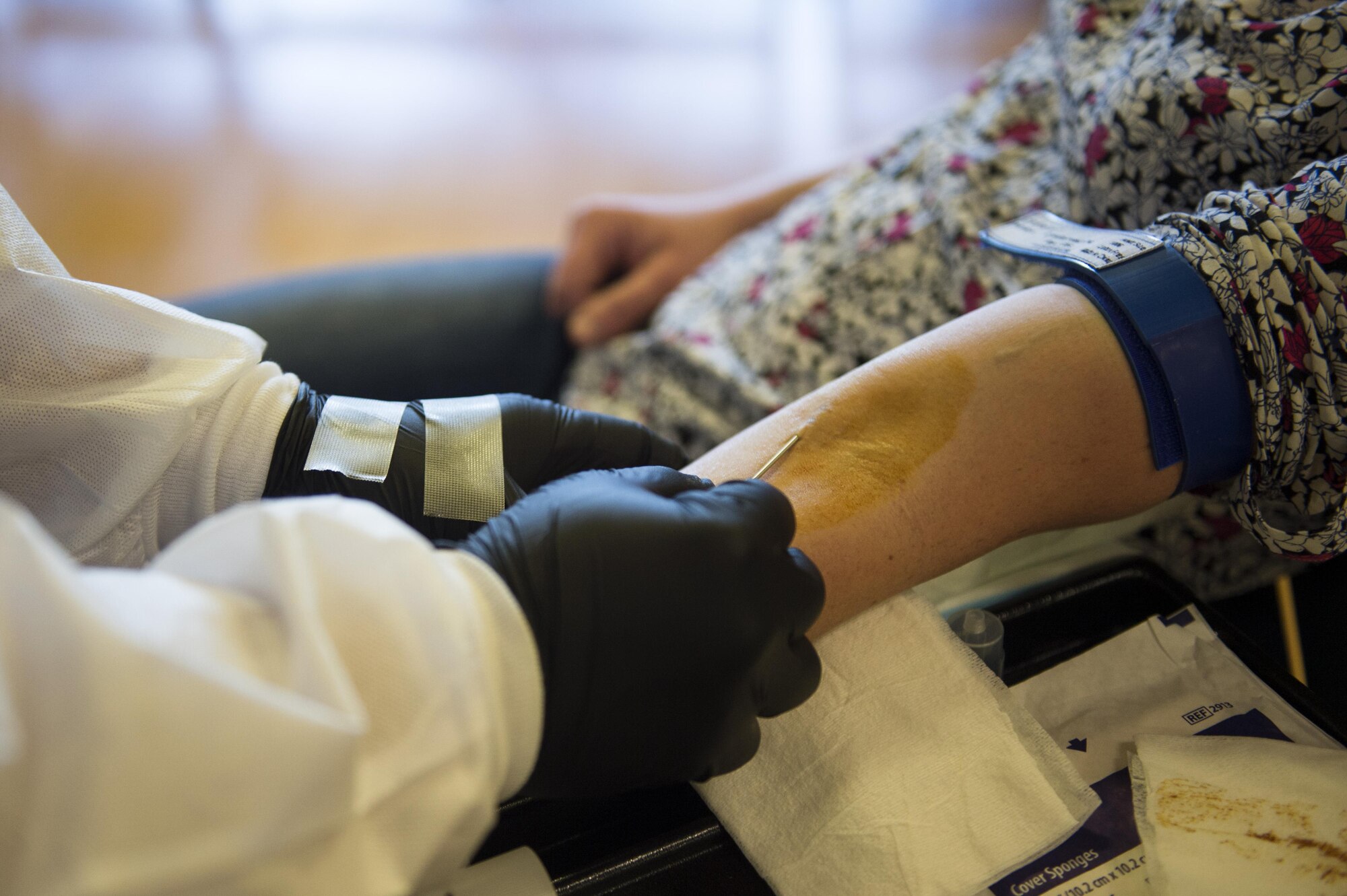 Jessica Behrens, a military spouse, donates blood during an Armed Services Blood Program blood drive in the Brick House at Spangdahlem Air Base, Germany, May 10, 2017. The ASBP Europe hosted the drive to distribute blood to patients within the military to include service members, their families, Department of Defense civilians and retirees.