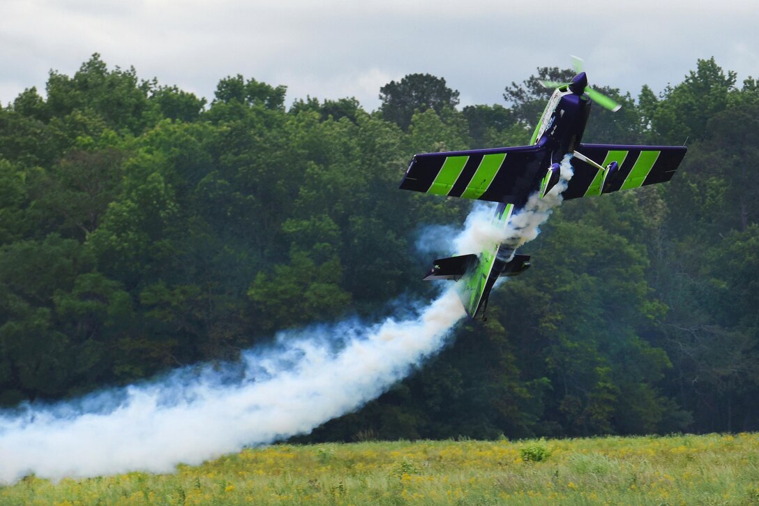 An MX2 aerobatic monoplane, piloted by Gary Ward, performs during the South Carolina National Guard Air and Ground Expo at McEntire Joint National Guard Base, S.C., May 5, 2017. The expo showcases South Carolina National Guard airmen and soldiers. Air National Guard photo by Senior Master Sgt. Edward Snyder