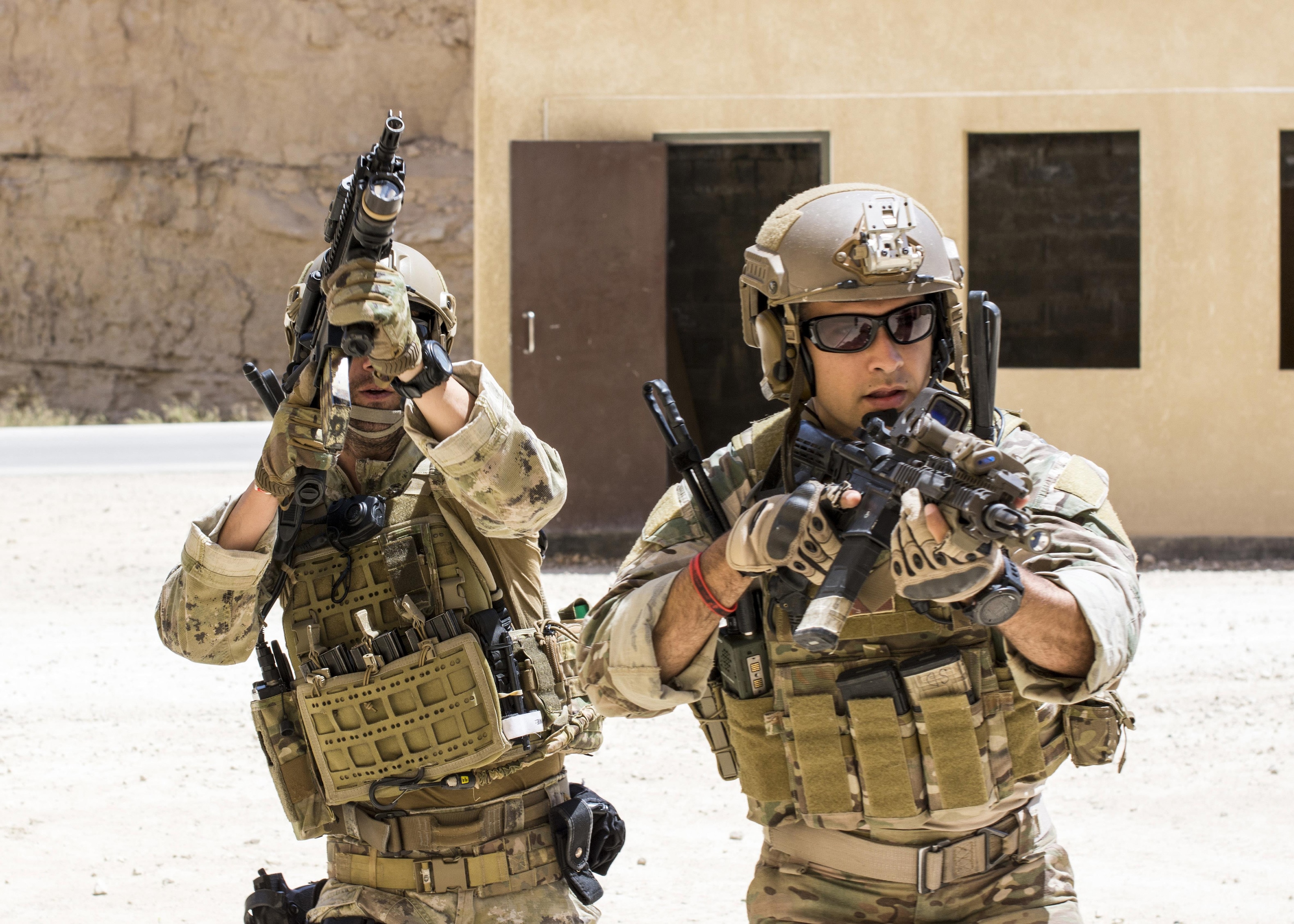 A member of the Air Force Special Operation s 23rd Special Tactics Squad and Italian Special Forces participate in small unit tactics at the King Abdullah II Special Operations Training Center in Amma...