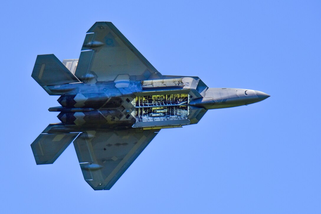 An F-22 Raptor fighter jet performs an aerial demonstration maneuver during the South Carolina National Guard Air and Ground Expo at McEntire Joint National Guard Base, S.C., May 6, 2017. Air National Guard photo by Senior Airman Megan Floyd