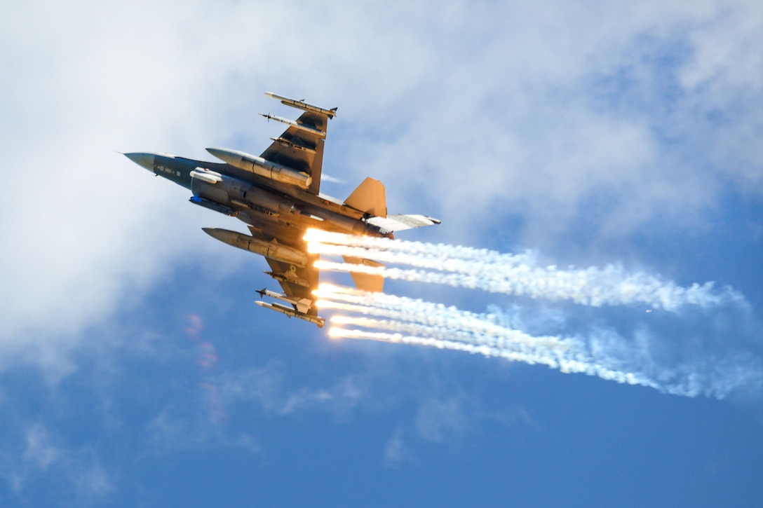 An Air Force F-16 Fighting Falcon aircraft releases flares during the South Carolina National Guard Air and Ground Expo at McEntire Joint National Guard Base, S.C., May 6, 2017. The pilot is assigned to the South Carolina Air National Guard’s 169th Fighter Wing. Air National Guard photo by Tech. Sgt. Jorge Intriago