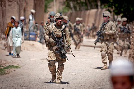 Paratroopers with the 82nd Airborne Division's 1st Brigade Combat Team patrol a village in Ghazni Province, Afghanistan, May 29, 2012. The paratroopers are assigned to Company C, 2nd Battalion, 504th Parachute Infantry Regiment. 